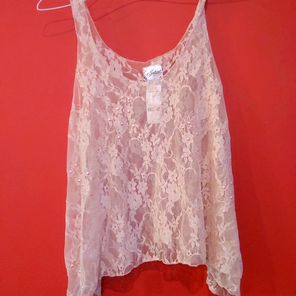 Misses light pink see-through filigree over top
